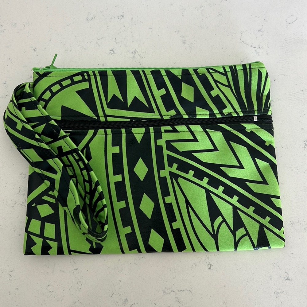Wristlet bag from Samoa, green and black tribal print.